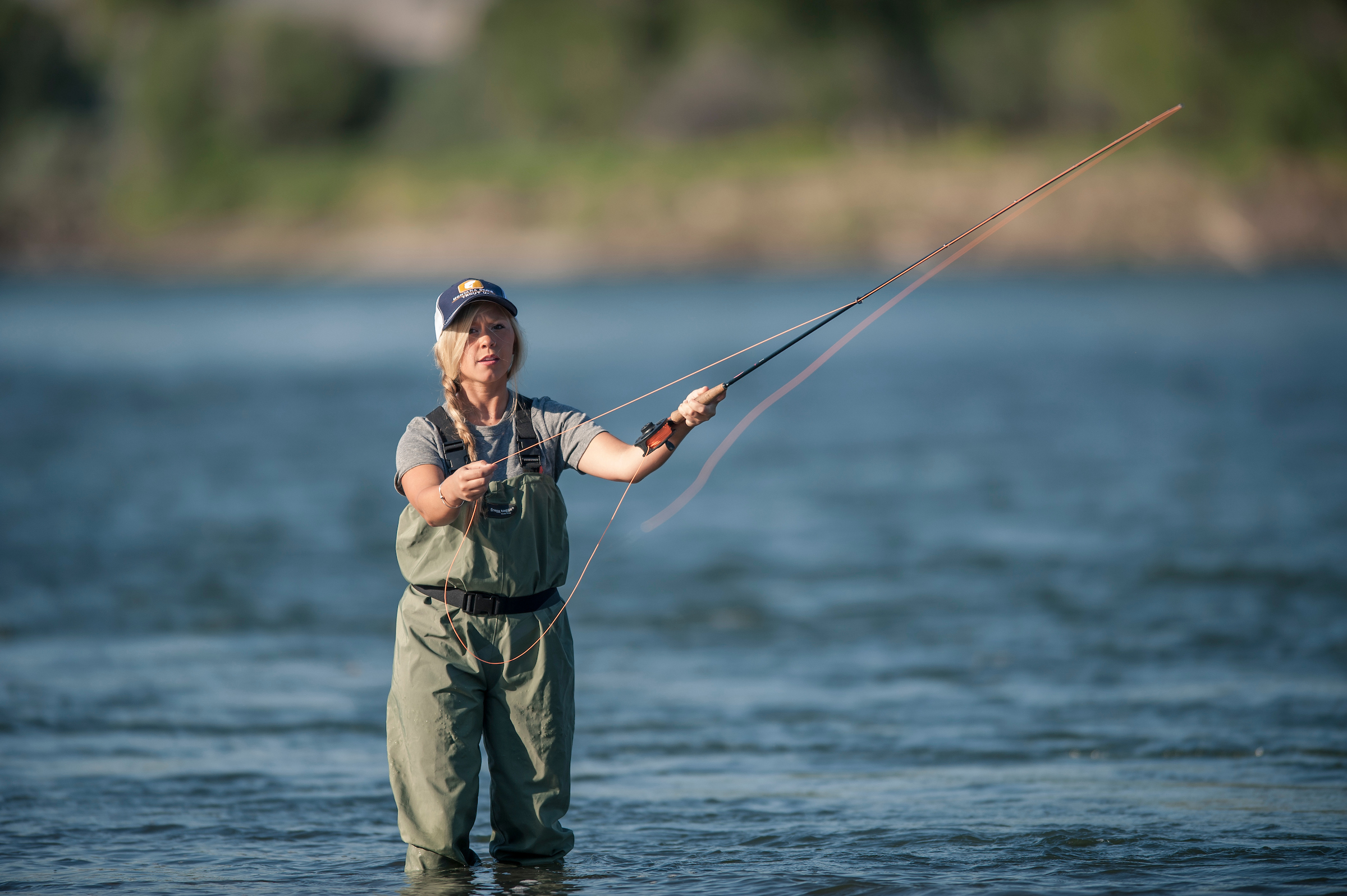 woman fly fishing