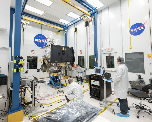 Engineers test the VIPER rover's wheel movement and rotation in a clean room at NASA's Johnson Space Center in Houston.