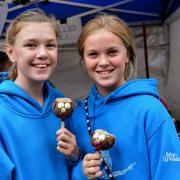 Rebecca Musgrave and Eryn Barker about to tuck into dog-shaped chocolate lollies