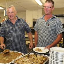 Feeding the masses ... Serving diners at a community dinner last year are North Canterbury...