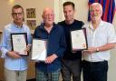 Steven MacLean presents honorary life memberships to Tweedvale founders Colin MacDonald, Findlay Ferguson and John Blair