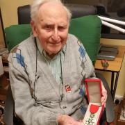 John McOwan with his medal - Photo John Hislop