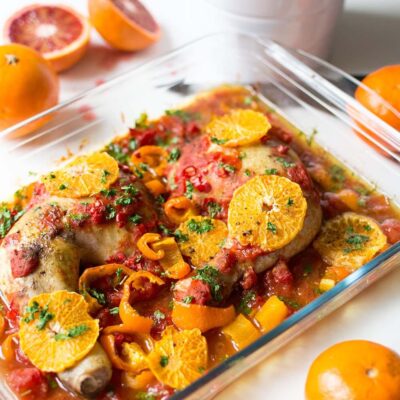 Запеченные куриные окорочка с овощами и апельсином - рецепт с фото