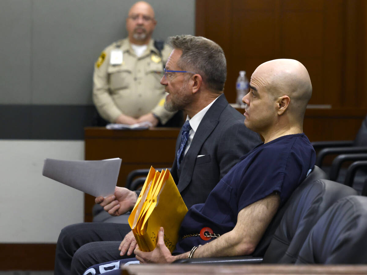 Attorney Robert Draskovich, left, addresses the court as his client Robert Telles, a former Cla ...