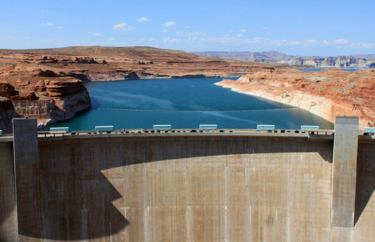 The Glen Canyon Dam is seen, Aug. 21, 2019, in Page, Ariz. (AP Photo/Susan Montoya Bryan, File)