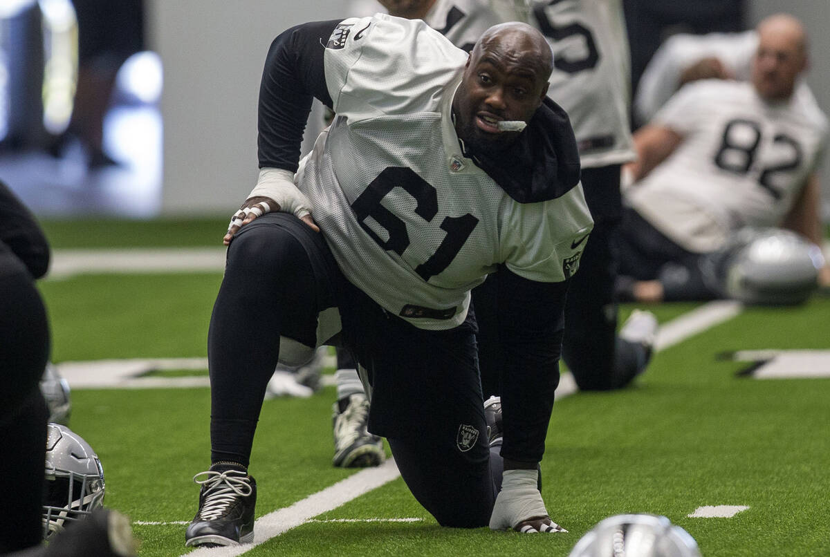 Las Vegas Raiders center Rodney Hudson (61) stretches during a practice session at the Intermou ...