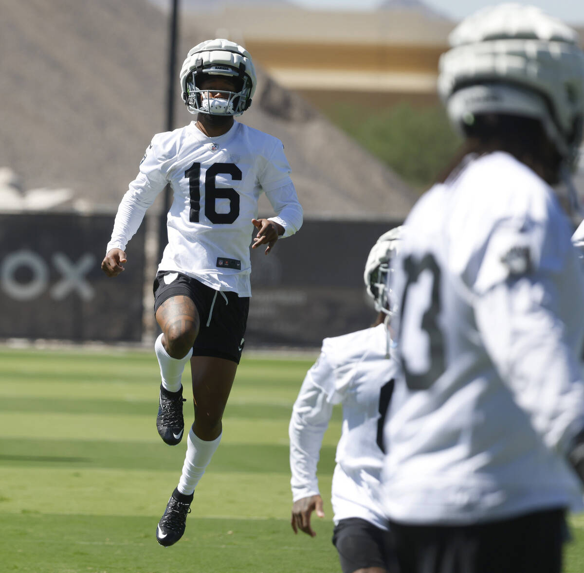 Raiders wide receiver Jakobi Meyers (16) warms up during organized team activities at the Inter ...