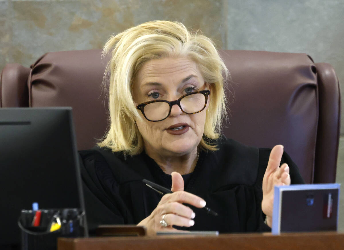 District Court Judge Michelle Leavitt presides over a status check in the case of Robert Telles ...