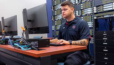 Person working at a computer.