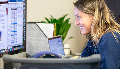 Student sitting at a computer.