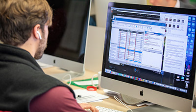 Student sitting in front of computer.