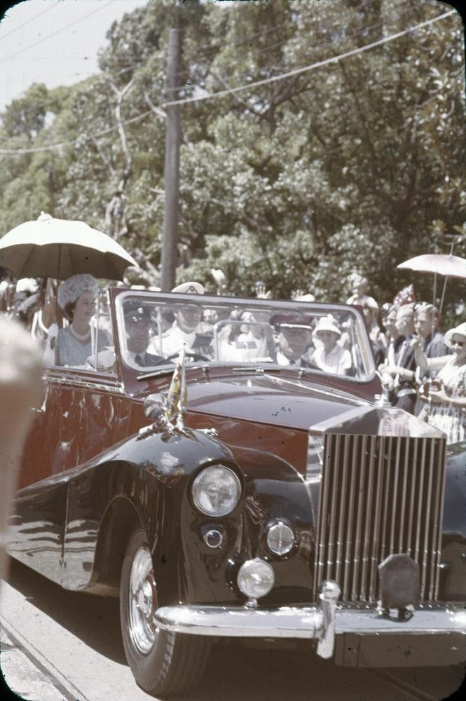 Queen Elizabeth II rides in a Rolls Royce during her visit to Brisbane, 1954