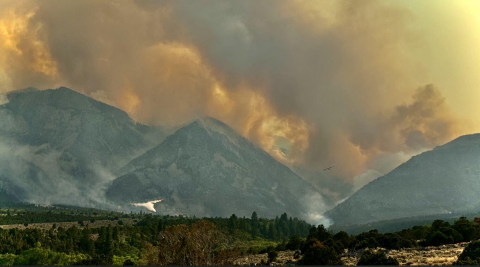 (Sheena Waters Gilbert) The Silver King Fire burns west of Marysvale, Utah, as captured by firefighter Sheena Waters Gilbert. The wildfire was caused by lightning and discovered on Friday, July 5, 2024.