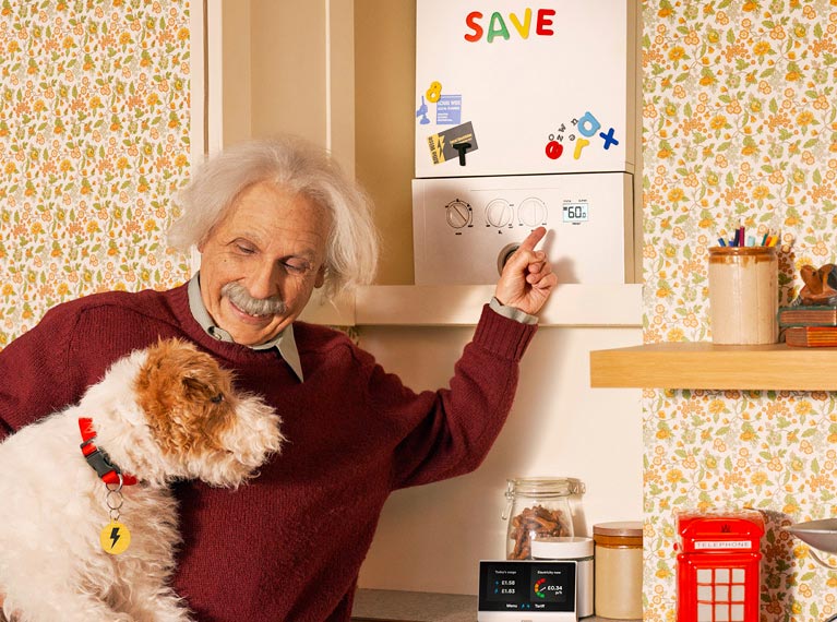 Albert Einstein showing his dog Chico his boiler.