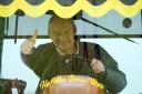 Sir Ed Davey drives a tractor during a visit to Owl Lodge in Lacock, Wiltshire (Andrew Matthews/PA)