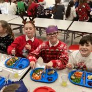 Children enjoy a Christmas lunch at St John's C of E Primary School in Wellington.