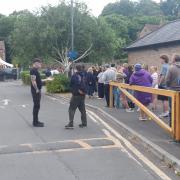 Queues formed outside the Cheese and Grain on Thursday.