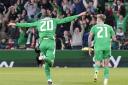 Republic of Ireland striker Troy Parrott celebrates his late winner against Hungary (Niall Carson/PA)