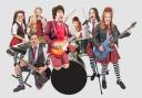 Cast members of School of Rock by Quarry Bank Musical Theatre Society