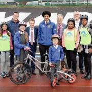 Dean Hill - Sport England, Mayor Andy Street, campaigner Dave Viner, Adam Tranter - cycling and walking commissioner, with cyclists Al Campbell, Harby Duggal, Street, Kristian Larigo, Tracy McLean, Chrystal Campbell, Sam Henry, Scarlett and Noah, front.