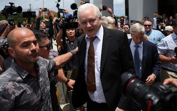 Assange leaves court a free man