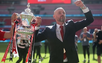 Erik ten Hag celebrates with the FA Cup trophy