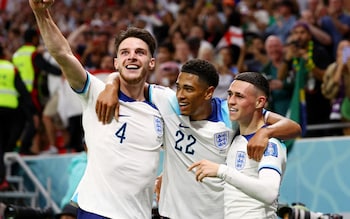 Decnlan Rice, Jude Bellingham and Phil Foden celebrate an England goal at the 2022 World Cup