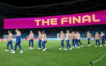 Members of the England team inspect the pitch at Stadium Australia the day before the World Cup final