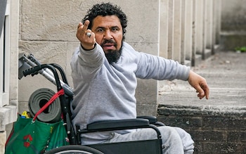 Yaser Ahmed reacts angrily outside Portsmouth magistrates' court, where he was convicted of stalking