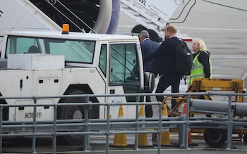 Prince Harry boards a British Airways flight from Aberdeen to Heathrow