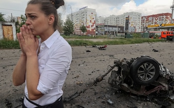 Local resident reacts at a site of a Russian air strike, amid Russia's attack on Ukraine, in Kharkiv, Ukraine May 22, 2024.