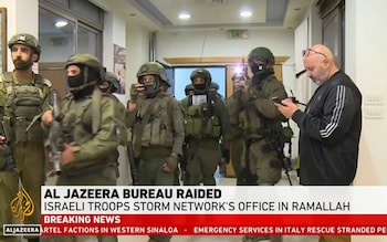 Israeli troops raid the Al Jazeera bureau in Ramallah