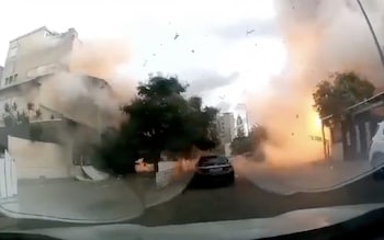 Dashcam footage shows the moment a Hezbollah rocket hit the Haifa suburb of Kiryat Bialik on Sunday morning