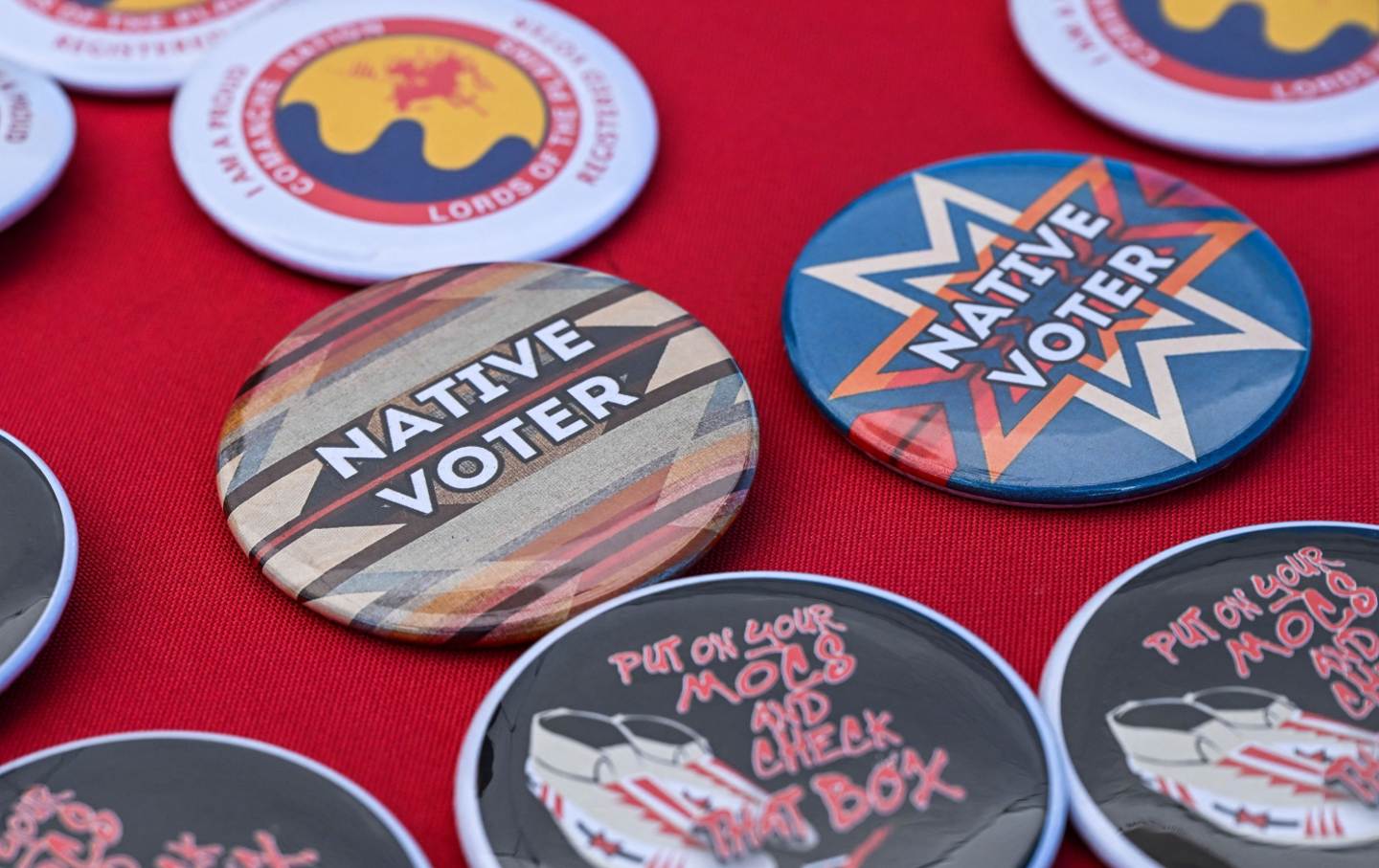 Pins are pictured at a display counter during a cultural meeting at the Comanche Nation fairgrounds in Lawton, Oklahoma, on September 30, 2023