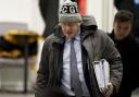 Former prime minister Boris Johnson leaves the UK Covid-19 Inquiry in London on Wednesday