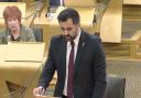 Humza Yousaf was spotted wearing a pink and purple badge at FMQs