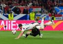Scotland's Stuart Armstrong (right) is brought down by Hungary's Willi Orban during the UEFA Euro 2024 Group A match at the Stuttgart Arena in Stuttgart, Germany