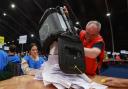 A ballot box is emptied at the Titanic Exhibition Centre, Belfast