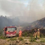 Scores of firefighters were drafted in to tackle the Cannich wildfire last summer