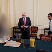 Then prime minister Boris Johnson (left), with then chancellor of the exchequer Rishi Sunak, at a gathering in the Cabinet Room in 10 Downing Street on his birthday