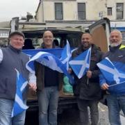 David Ennis and brother Brian are joined by Les Ward and an American supporter to launch Ukraine mission