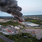 Fire crews are continuing to tackle the blaze