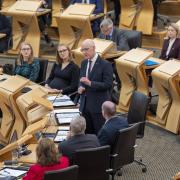 First Minister of Scotland John Swinney during First Minister's Questions at the Scottish Parliament in Holyrood, Edinburgh. Picture date: Thursday May 16, 2024..