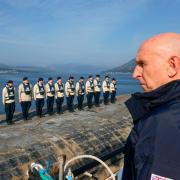 Defence Secretary John Healey and a Vanguard-class nuclear submarine in an image released by the MoD