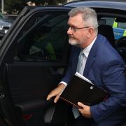 Former DUP leader Sir Jeffrey Donaldson arriving for an arraignment hearing at Newry Court