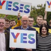 John Swinney (centre) joined activists to launch a new leaflet on independence  on Saturday