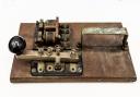 This Morse Code table, fitted with an oscillator key, is one of the most eye-catching objects in the Catterick Garrison Library exhibition