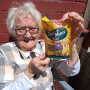 Mum with her lucky dog biscuits