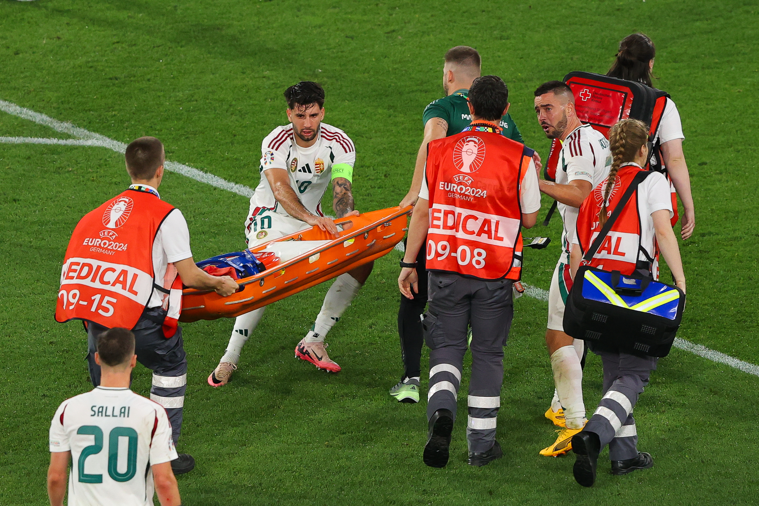 Dominik Szoboszlai rushed over to help his team-mate and hurried the medics onto the pitch