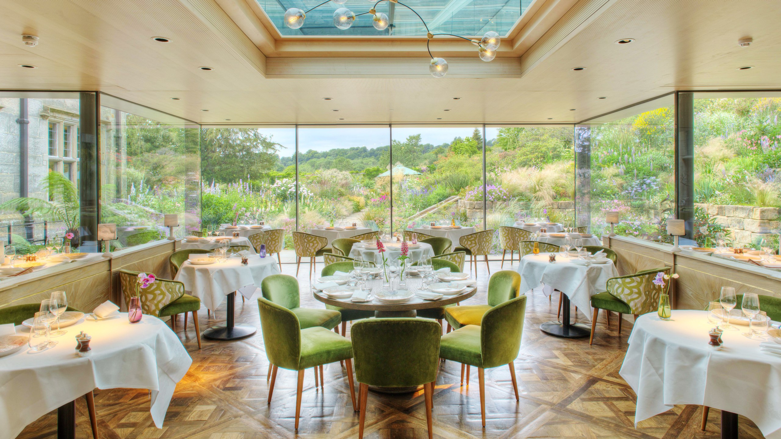The glass-box restaurant, launched in 2018, offers glorious garden views